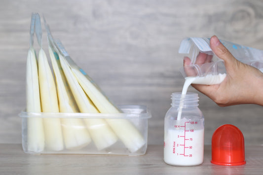 Pouring breast milk into baby bottle and storing it in breastmilk bags